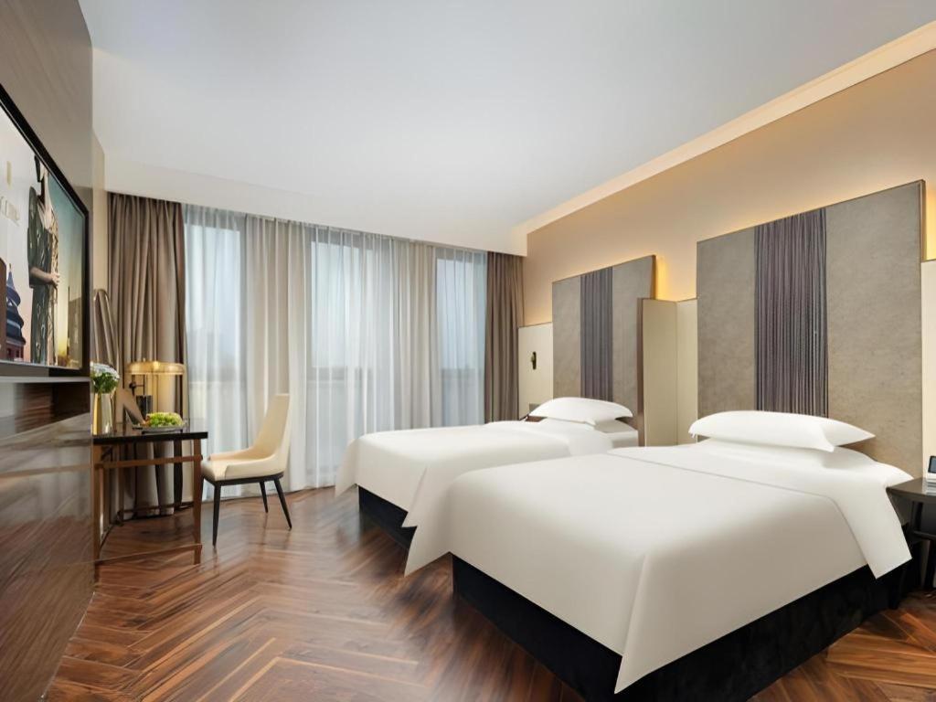 Jinjiang Metropolo Hotel - Taizhou Wanda Plaza Exterior foto